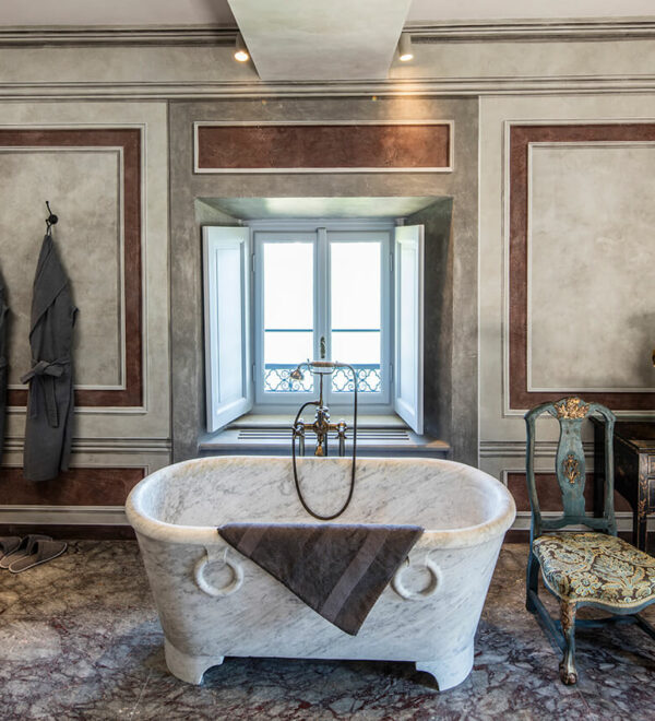 Villa Como luxury exclusive property Lake Como Milan second floor suite classic bedroom antique furniture marble bathroom 17 century Durini interiors