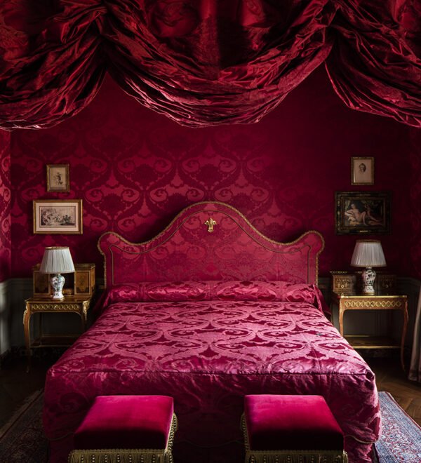 Chateau de Villette private rental uique property in France second floor red bedroom guest night stay linen service